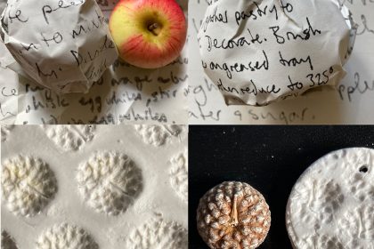 An apple next to an apple wrapped in a recipe, next to it another example of an recipe wrapped apple and below, patterns made by pressing an acorn top into air dried clay, showing the trick of the light that makes it hard to tell if the pattern is sunk in to the clay or sitting on the top if it