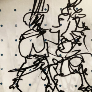 Sketch of two models on the runway, drawn on pattern paper printed with dots and crosses