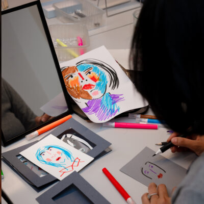 Self-portrait workshop: participant illustrating