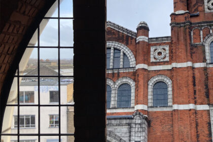 Exterior of Memorial Community Church and view towards the Royal Docks from the studio window