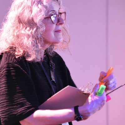 Lydia in action, drawing with highlighters