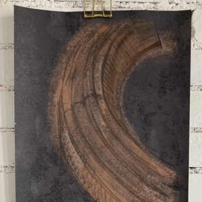 Drawing of banister detail, in clay on dark wallpaper