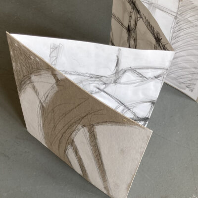 Concertina of shadow tracings with board covers