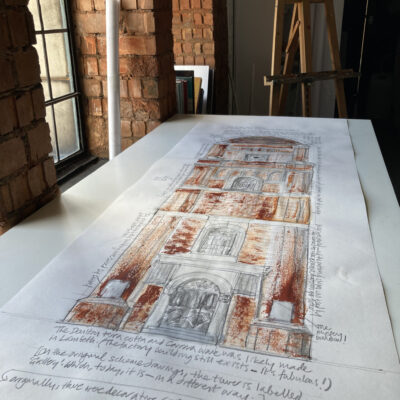 1m drawing of tower on desk in residency studio