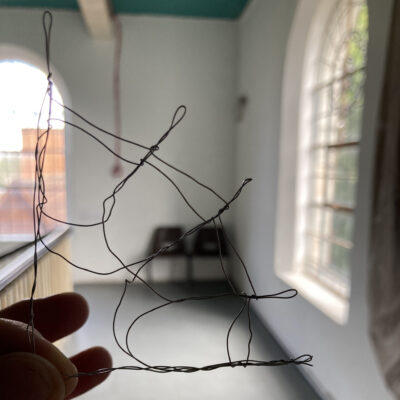 Wire drawing of window detail, held up