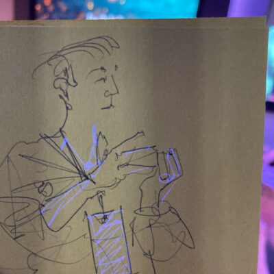 Kaye speaking, drawn on yellow paper