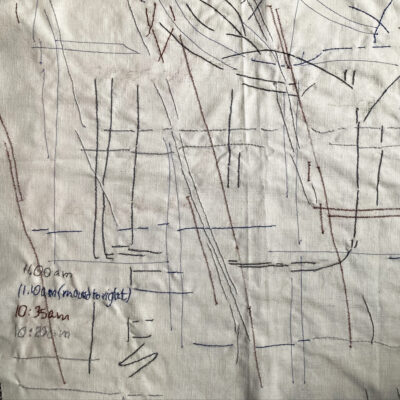 Textile shadow tracing with lines colour coded for time and embroidered time notes, light beckground