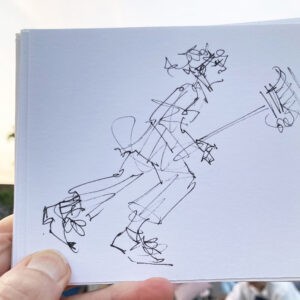 Sketch of comedy moment by opera performer, galloping with a 'horse' made from Cinderella's broom