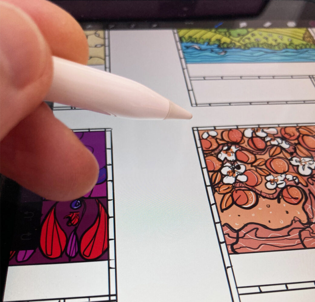 Lydia's hand holding an Apple Pencil, over an iPad screen showing label illustration work in progress