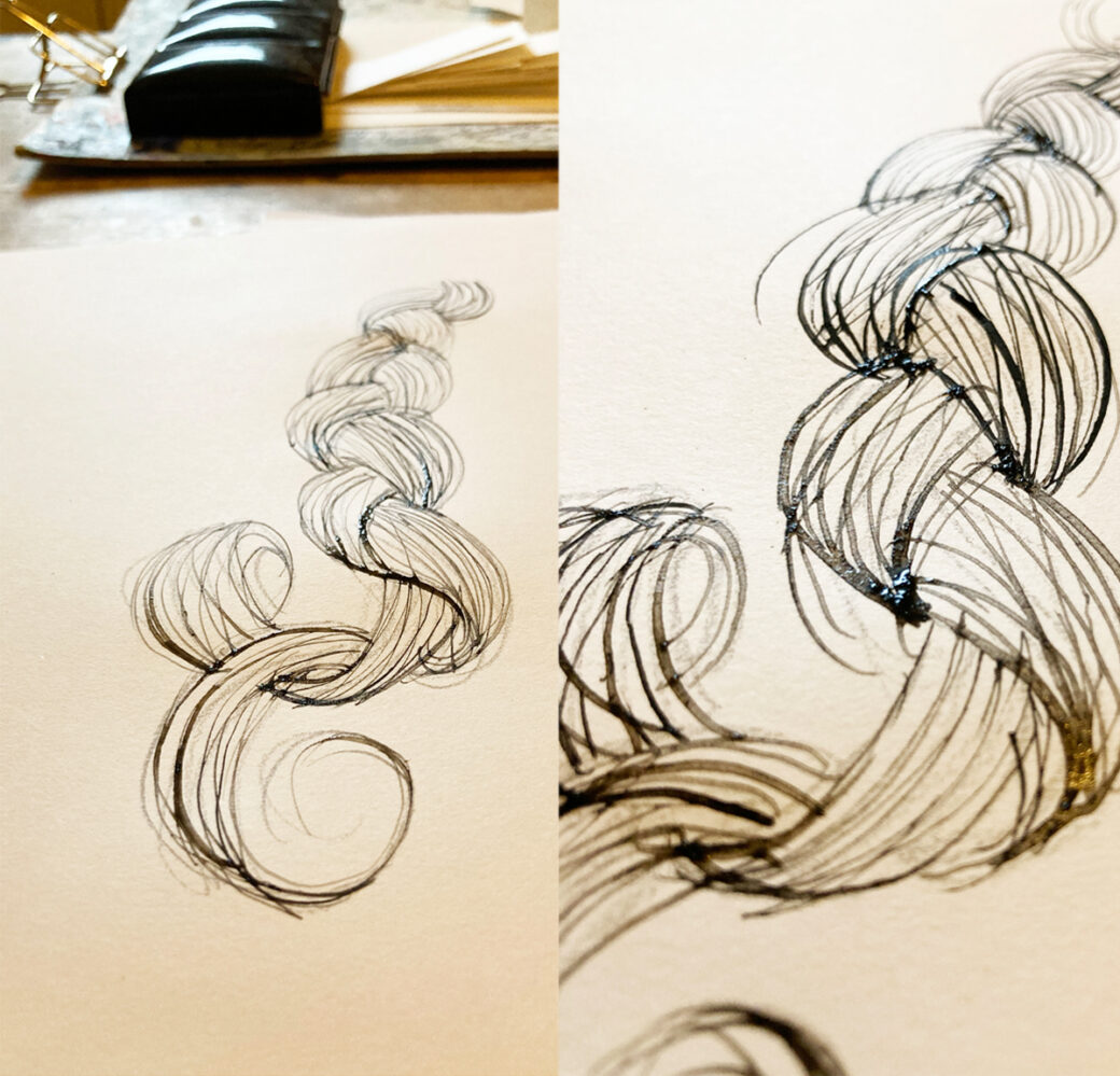 Montage of the original illustration on a wooden table with art materials n the background and the illustration with ink still wet.